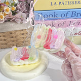 レインボークリームロールケーキスクイーズ スローリバウンド ストレス解消グッズ 高品質 ハンドメイド 食品グレードシリコン 学生ギフト